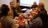 Having a meeting with the warden